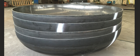 Quality assurance and corrosion protection of coated carbon steel head
